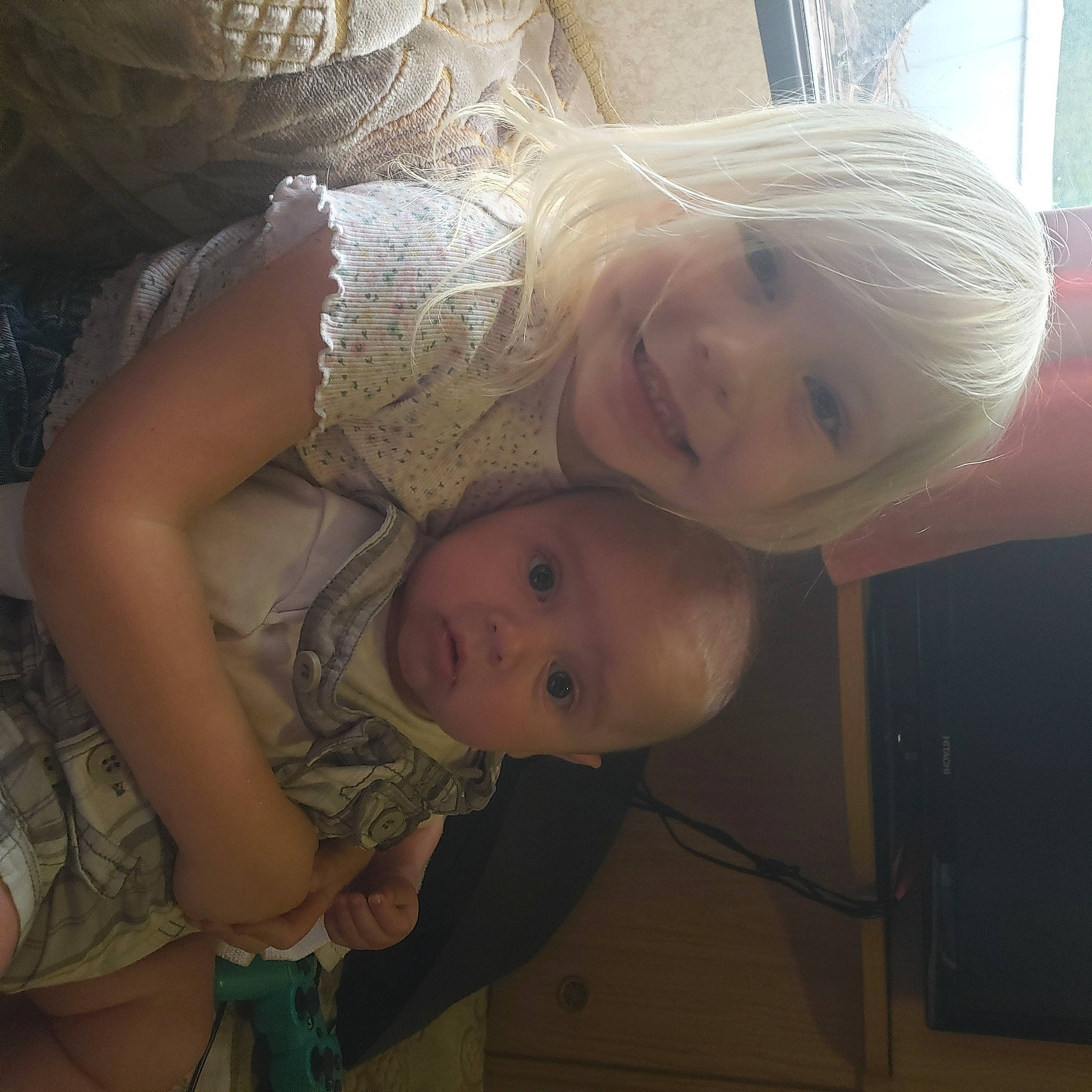 Jaxon is registered to the contest to win money with this photo: baby, cheek, child, comfort, eye, eyebrow, flash_photography, fun, gesture, hand, happy, human_body, iris, joy, lip, mouth, nose, organ, person, skin