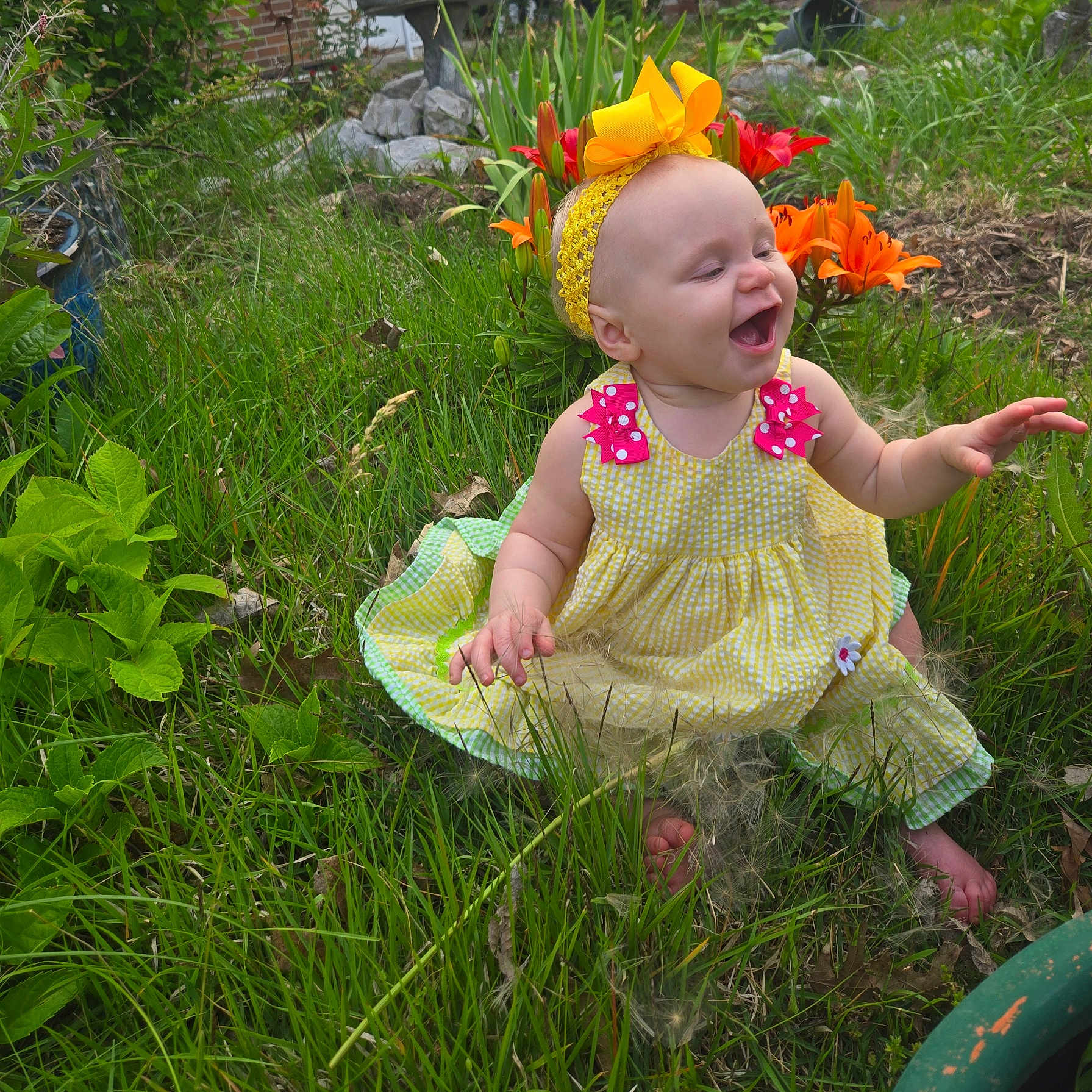 Eleanor-Rose joined the competition — help win amazing prizes! baby, barefoot, child, cute, flowers, garden, grass, greenery, happy, headband, nature, orange_lilies, outdoor, plants, playful, sitting, smiling, sunny_day, toddler, yellow_dress
