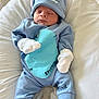 newborn, baby, sleeping, blue_outfit, hat, mittens, stitch, disney, infant, cute, soft_blanket, clothing, resting, white, portrait, child, indoors, comfortable, peaceful, babywear