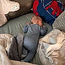 Dean is registered to the contest to win money with this photo: baby, bed, blanket, blue_onesie, couch, cozy, cute, face_down, furniture, hand_pillow, indoors, infant, nap, pillow, resting, sleeping, soft, toddler, toy, warm