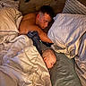 Dean is registered to the contest to win money with this photo: baby, bed, blanket, child, comfort, couch, cozy, fabric, home, indoors, nap, peaceful, person, pillow, relaxation, rest, skin, sleeping, soft_lighting, young_adult