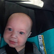 Janson joined the competition — help win amazing prizes! baby, child, car_seat, seatbelt, closeup, infant, face, straps, clothing, smile, young, person, head, indoors, seat, fabric, safety, cute, baby_boy, car