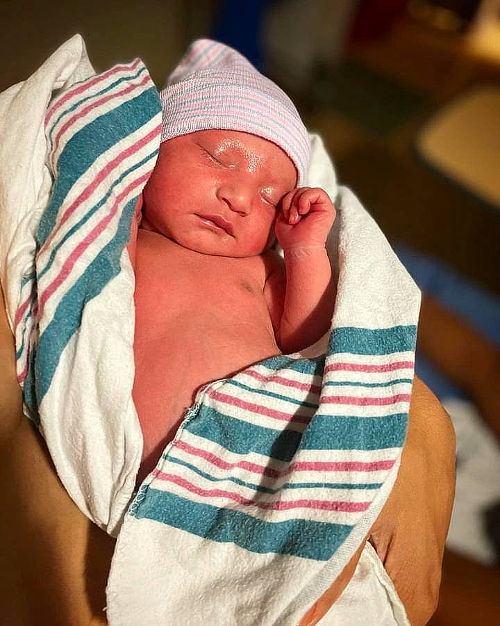 Darcy joined the competition — help win amazing prizes! abdomen, arm, baby, baby_sleeping, cap, child, comfort, elbow, flesh, glasses, headwear, human_leg, linens, magenta, neck, pattern, person, plaid, shoulder, sleeve