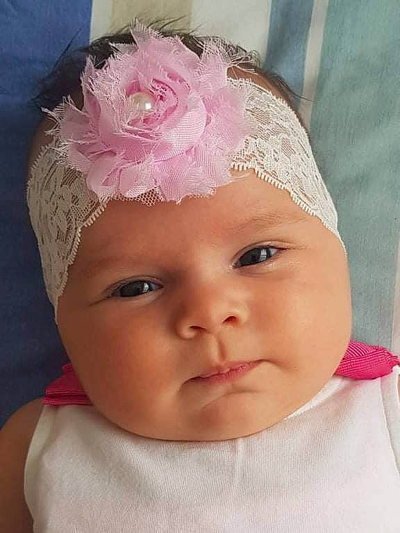 Amalia is registered to the contest to win money with this photo: baby, baby_toddler_clothing, cap, cheek, chin, cool, costume_hat, eye, eyebrow, eyelash, face, headgear, headpiece, headwear, lip, magenta, neck, person, pink, skin