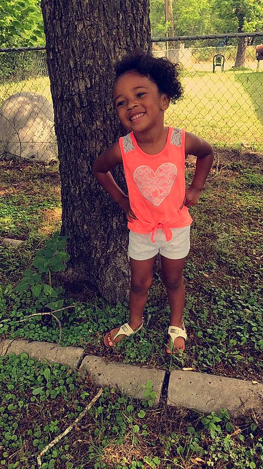 Alyza is registered to the contest to win money with this photo: child, clothing, emotion, facial_expression, fun, garden, girl, grass, green, joy, leaf, nature, path, person, plant, play, rural_area, smile, soil, tree