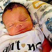 William joined the competition — help win amazing prizes! baby, newborn, sleeping, blanket, onesie, infant, face, peaceful, cute, child, resting, closeup, soft, cozy, portrait, skin, head, clothing, indoors, sleep