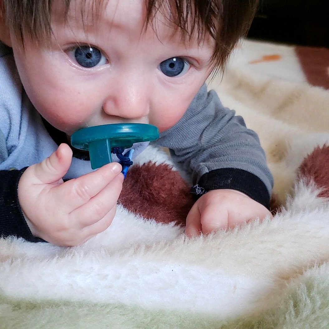 Kazden is registered to the contest to win money with this photo: boy, cheek, child, eye, face, finger, girl, hand, infant, iris, mouth, nose, person, play, product, skin, textile, toddler