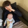Charles joined the competition — help win amazing prizes! baby, blanket, clothing, couch, cushion, face, family, furniture, head, homedecor, newborn, pants, people, person, photography, portrait, sad, sitting, sleeping, yawning
