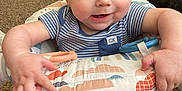 Charles is registered to the contest to win money with this photo: architecture, baby, bodypart, chair, clothing, couch, cushion, face, finger, furniture, hand, happy, head, homedecor, person, photography, portrait, shorts, sitting, t_shirt