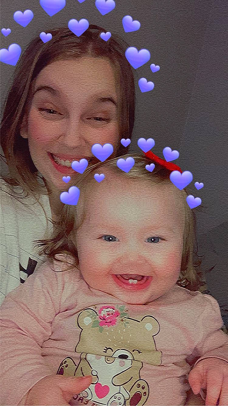 Oakley is registered to the contest to win money with this photo: art, baby_toddler_clothing, beauty, cheek, eyebrow, face, facial_expression, fun, happy, head, headgear, joy, lip, nose, organ, person, pink, purple, skin, smile