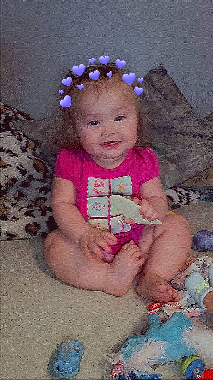 Oakley joined the competition — help win amazing prizes! baby, baby_toddler_clothing, cheek, child, comfort, facial_expression, finger, fun, happy, head, headgear, human, person, pink, purple, skin, sleeve, smile, textile, toddler