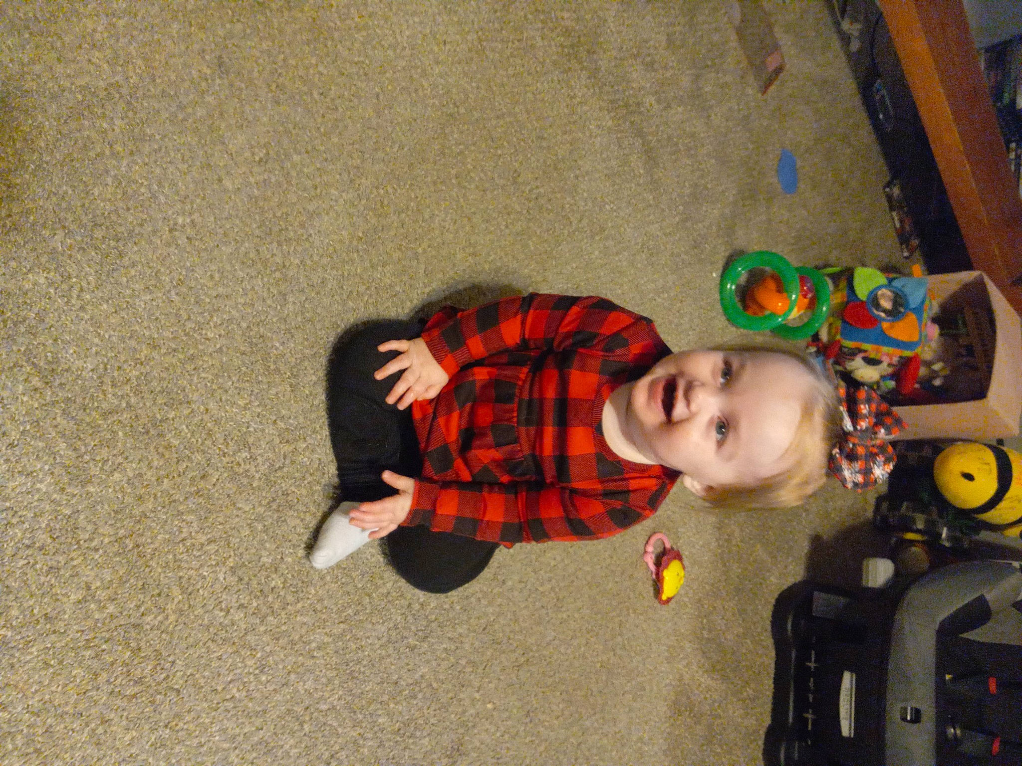 Brynleigh joined the competition — help win amazing prizes! baby, baby_products, baby_toddler_clothing, baby_toys, carmine, costume, flooring, fun, pattern, person, plaid, play, room, sitting, tartan, toddler, toy, wood