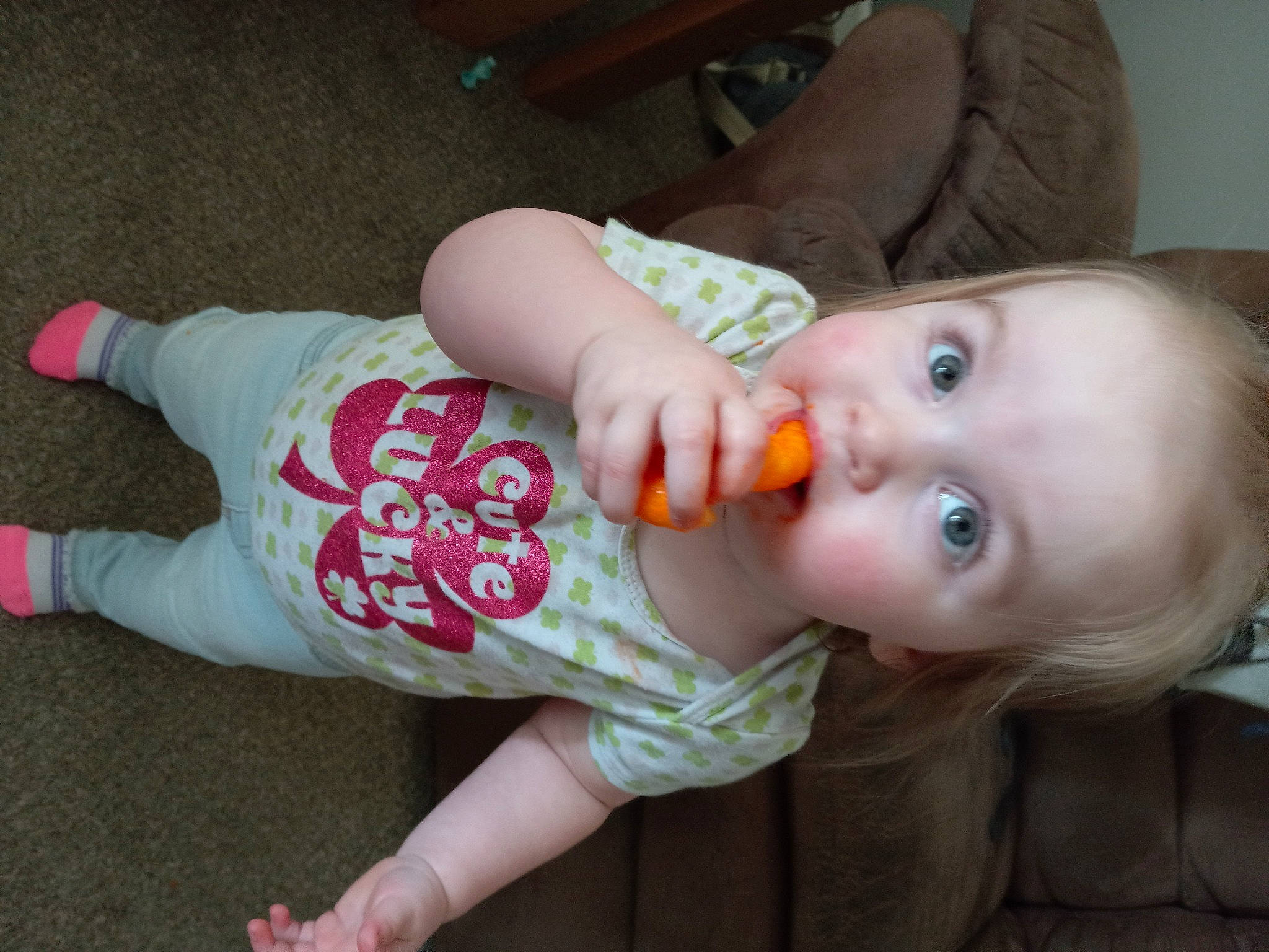 Brynleigh joined the competition — help win amazing prizes! baby, baby_toddler_clothing, cheek, child, chin, flooring, foot, fun, head, iris, joint, lip, mouth, nail, nose, person, sitting, skin, sleeve, toddler