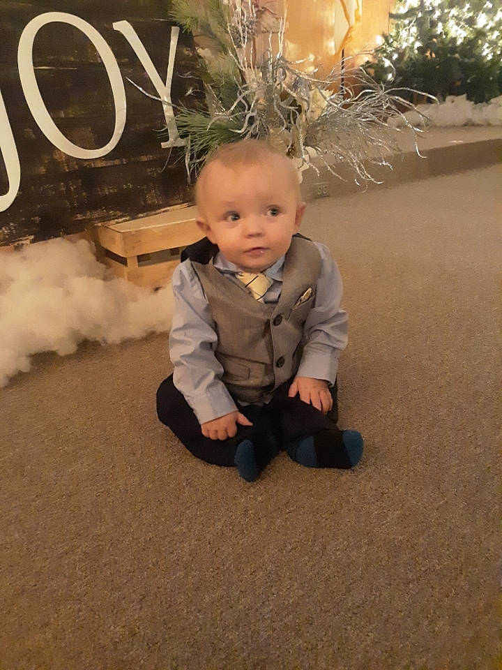 Castiel is registered to the contest to win money with this photo: art, baby, baby_toddler_clothing, child, event, flash_photography, flooring, fun, fur, grass, happy, people_in_nature, person, plant, portrait_photography, sitting, sleeve, toddler, tree, winter