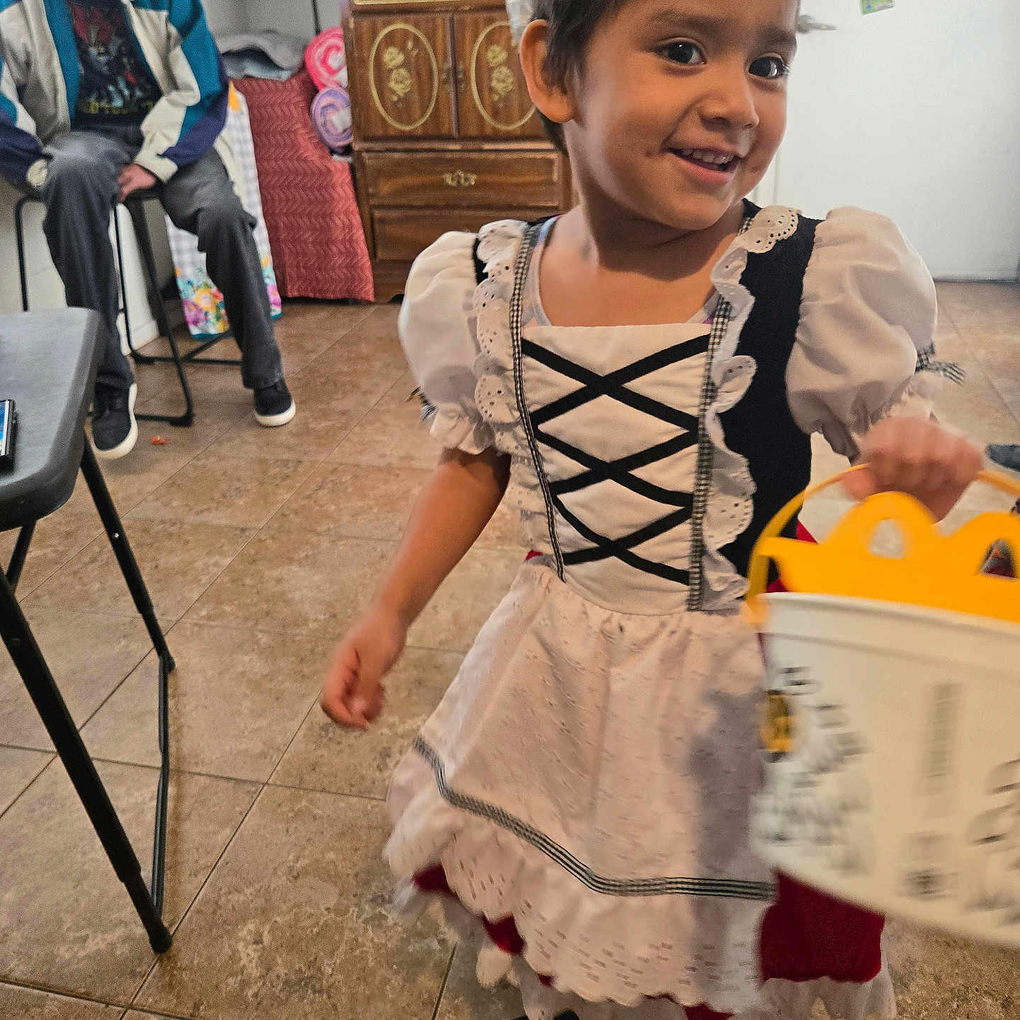 Kassidy is registered to the contest to win money with this photo: accessories, adult, child, clothing, costume, dress, face, female, footwear, furniture, girl, glasses, head, male, man, person, photography, portrait, shoe, wood