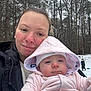 Natalia joined the competition — help win amazing prizes! woman, baby, child, outdoor, winter, snow, forest, hooded_jacket, pink_clothing, tears, nature, trees, cold_weather, family, portrait, person, smile, red_cheeks, play, clothing