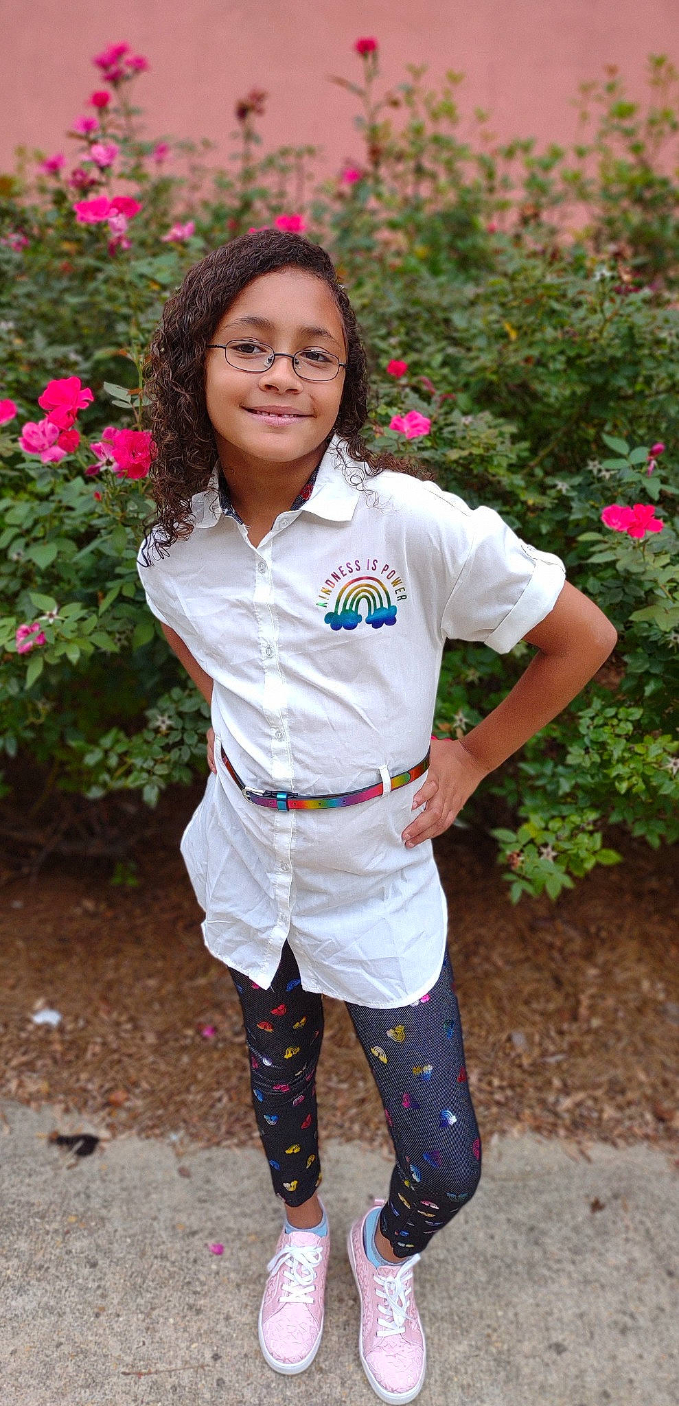 Parris is registered to the contest to win money with this photo: botany, eye, face, flower, glasses, happy, head, human_body, joy, leaf, outerwear, person, photograph, pink, plant, red, school_uniform, skin, sleeve, smile