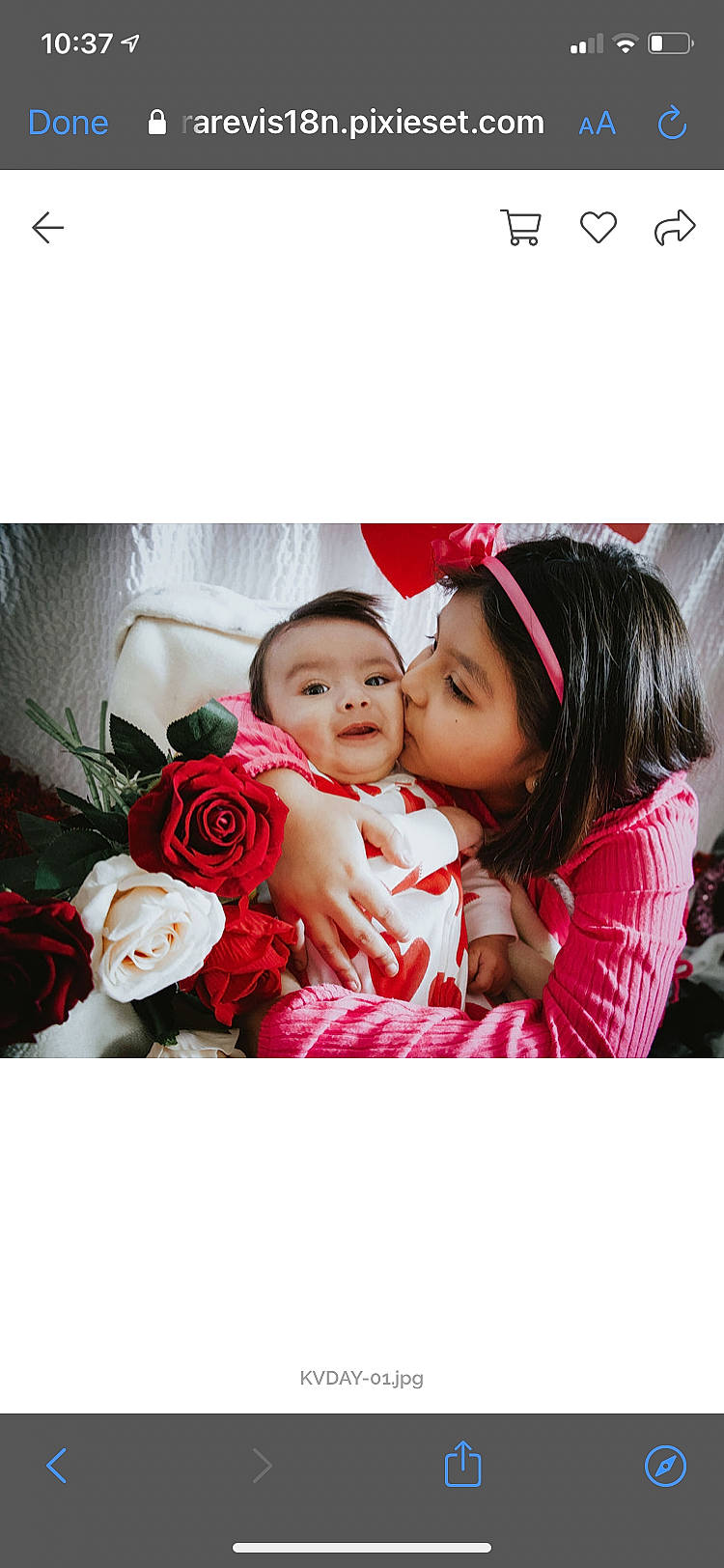 Gilbert is registered to the contest to win money with this photo: baby, child, dress, event, face, facial_expression, flower, gesture, hand, happy, hybrid_tea_rose, magenta, person, petal, picture_frame, plant, rose, selfie, shirt, sleeve