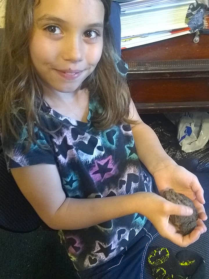 Brianna is registered to the contest to win money with this photo: arm, blond, brown_hair, child, fun, hair, long_hair, person, photography, selfie, smile, t_shirt