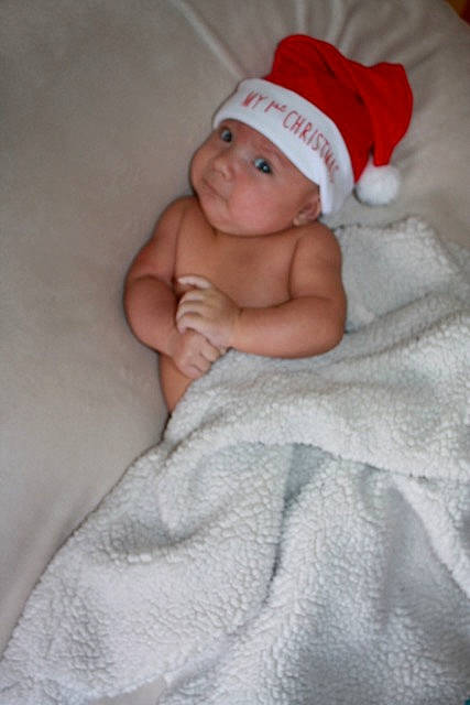 Oliver is registered to the contest to win money with this photo: cheek, child, finger, hand, headgear, headwear, infant, lip, mouth, person, product, skin, textile, toddler