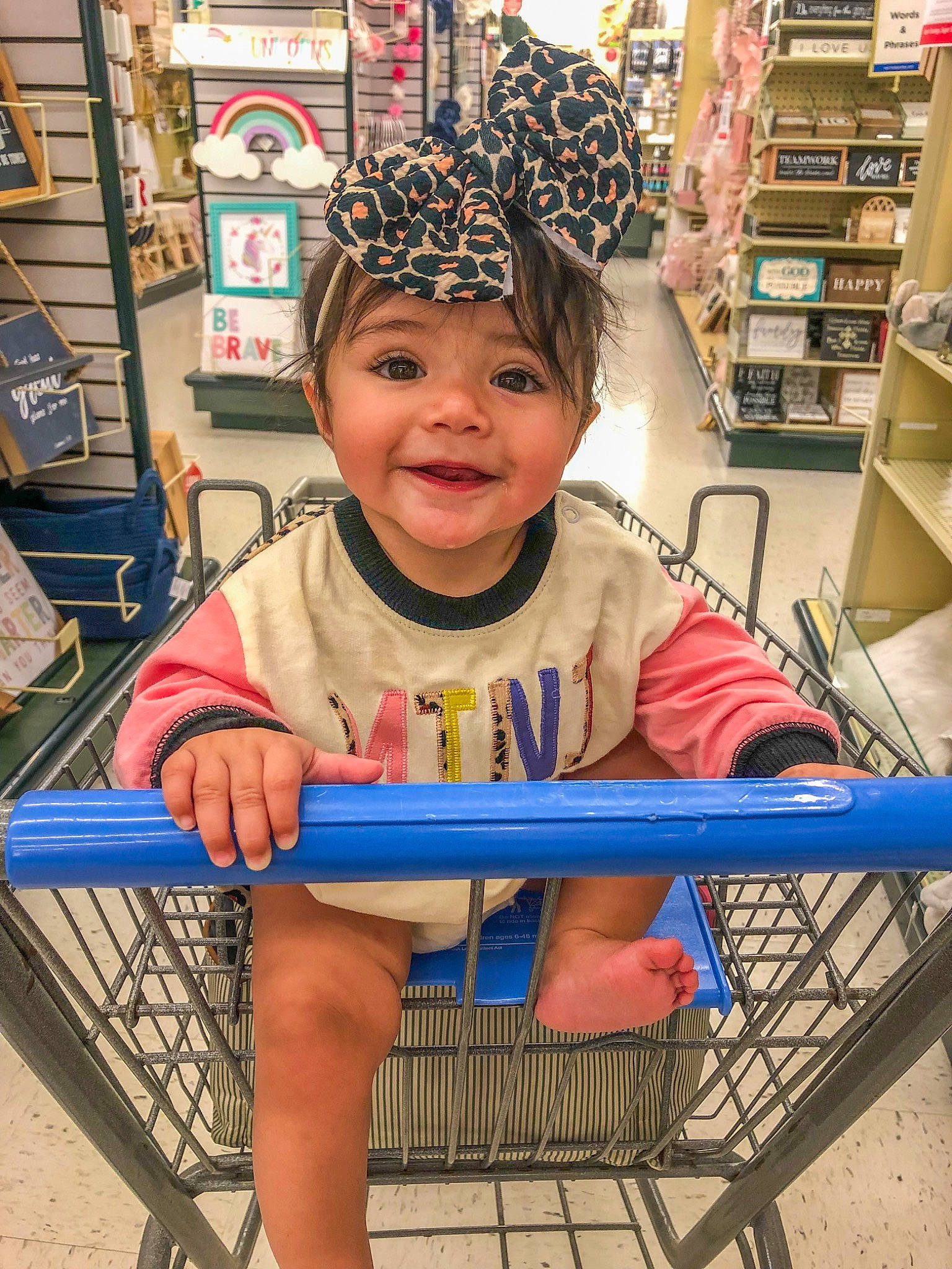 Jordyn joined the competition — help win amazing prizes! cart, chair, child, customer, fun, happy, headgear, headwear, human_leg, joy, leg, leisure, person, retail, shelf, shopping, shopping_cart, sitting, smile, tire