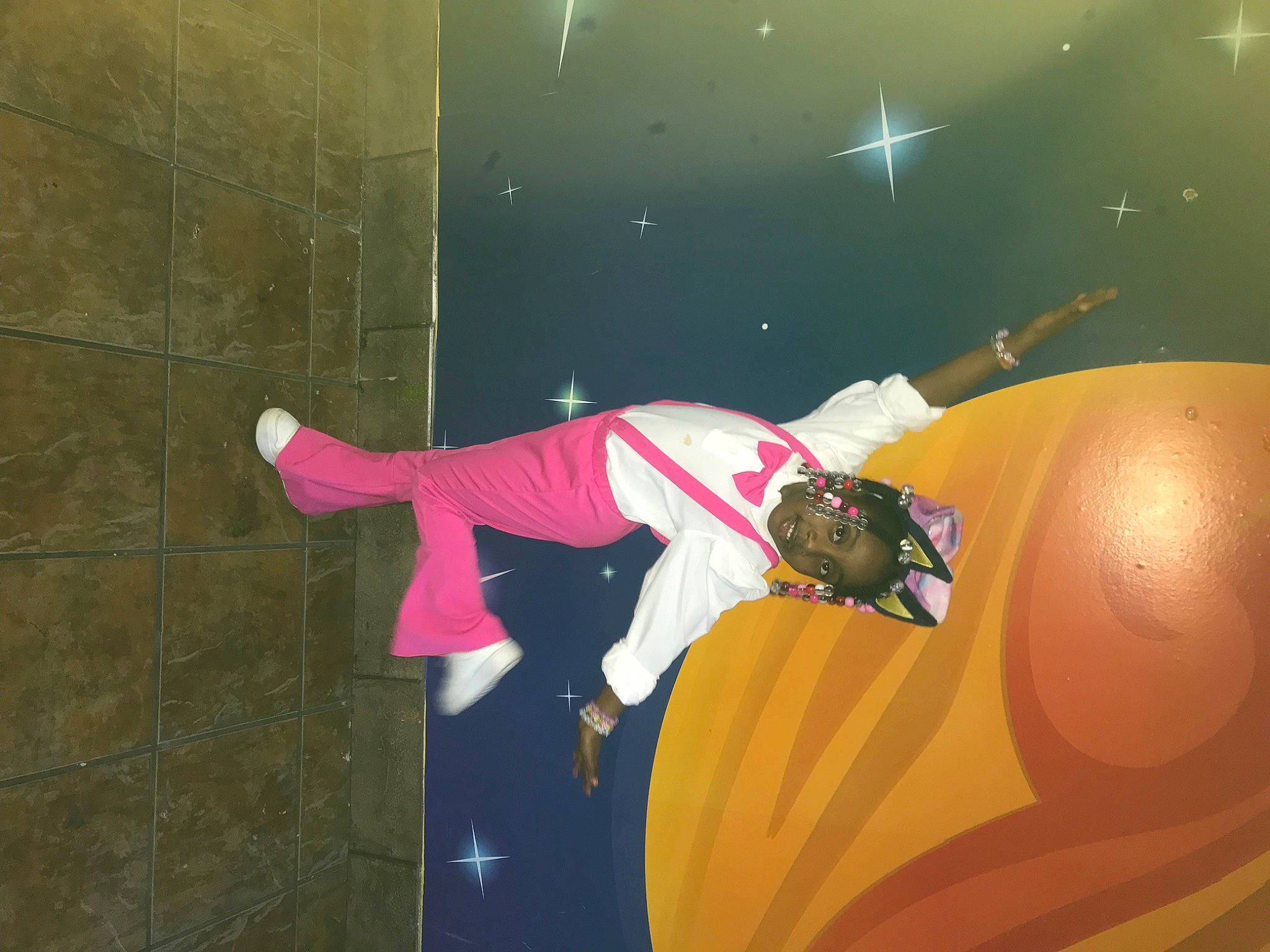 Royalty is registered to the contest to win money with this photo: art, astronomical_object, carmine, cg_artwork, entertainment, event, fictional_character, fun, human_body, magenta, performance, performance_art, performing_arts, person, room, visual_arts