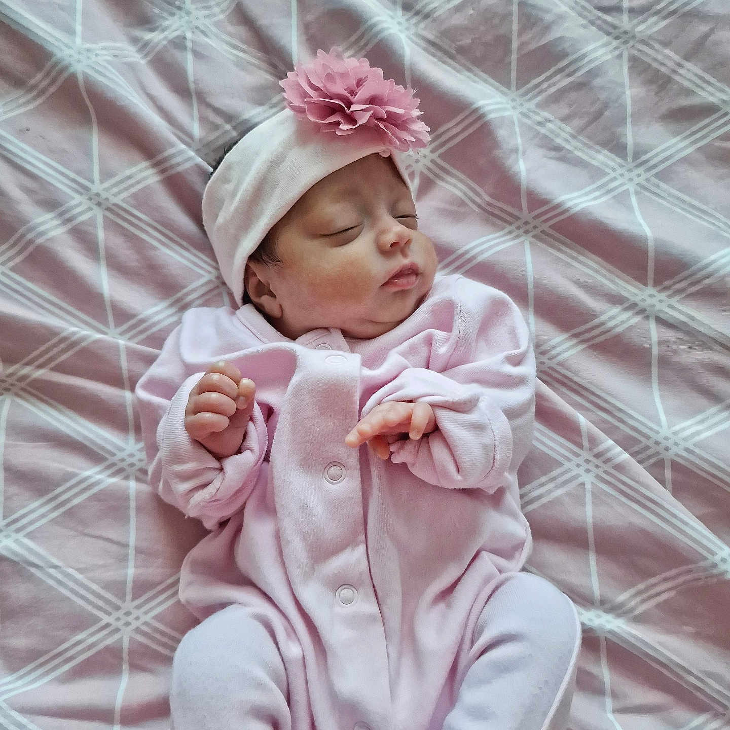 Peggy-Rose joined the competition — help win amazing prizes! baby, beanie, bed, bedroom, blanket, bodypart, bonnet, cap, clothing, face, finger, furniture, hand, hat, head, hood, indoors, newborn, person, photography