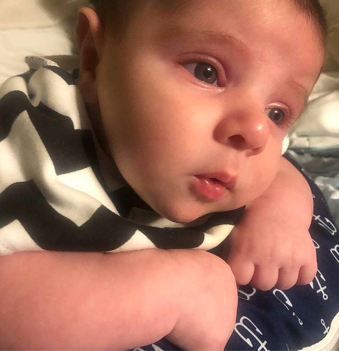 Donatello is registered to the contest to win money with this photo: baby, cheek, child, chin, cool, ear, eye, eyebrow, face, finger, hand, head, lip, mouth, muscle, nose, person, skin, smile, thumb