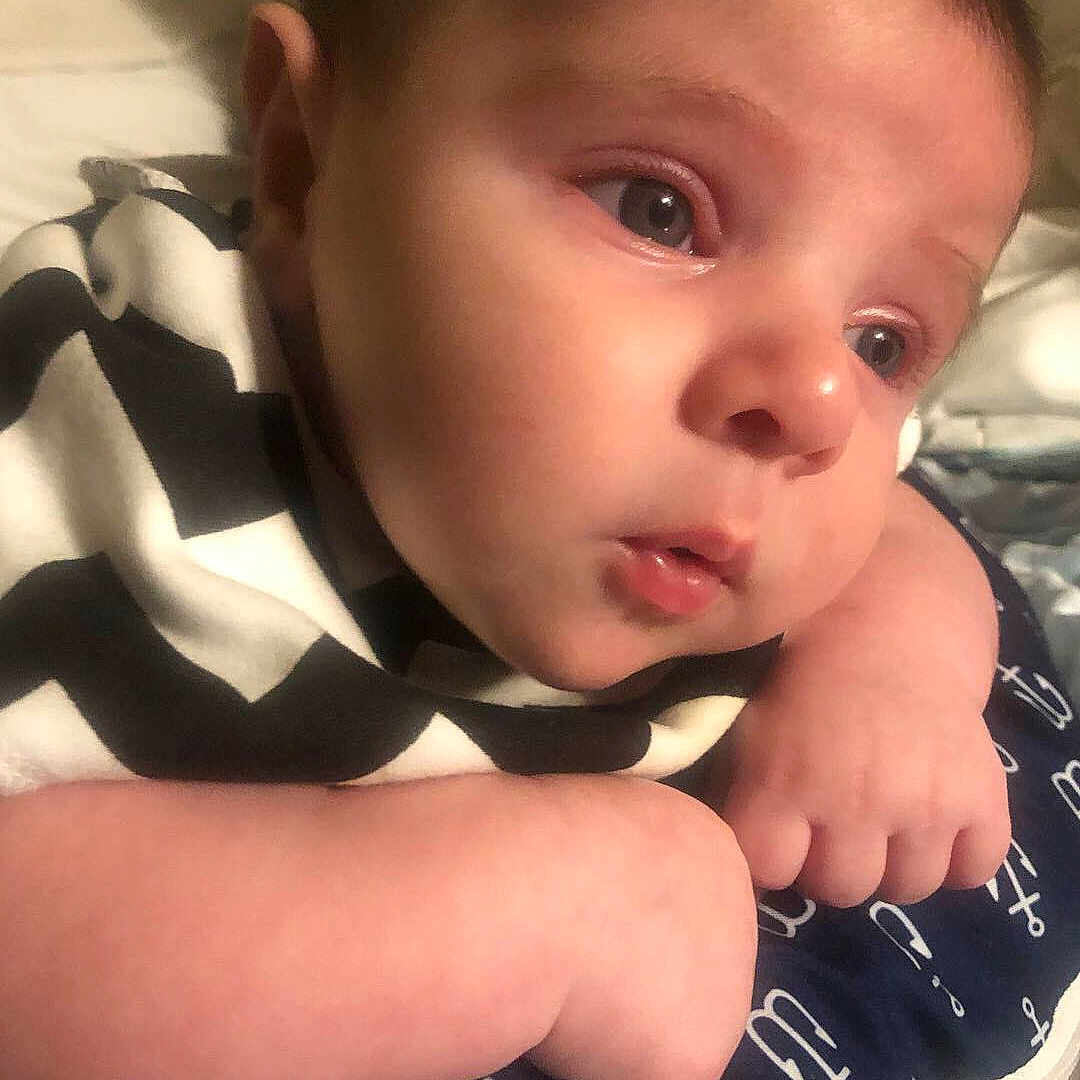 Donatello is registered to the contest to win money with this photo: baby, cheek, child, chin, cool, ear, eye, eyebrow, face, finger, hand, head, lip, mouth, muscle, nose, person, skin, smile, thumb