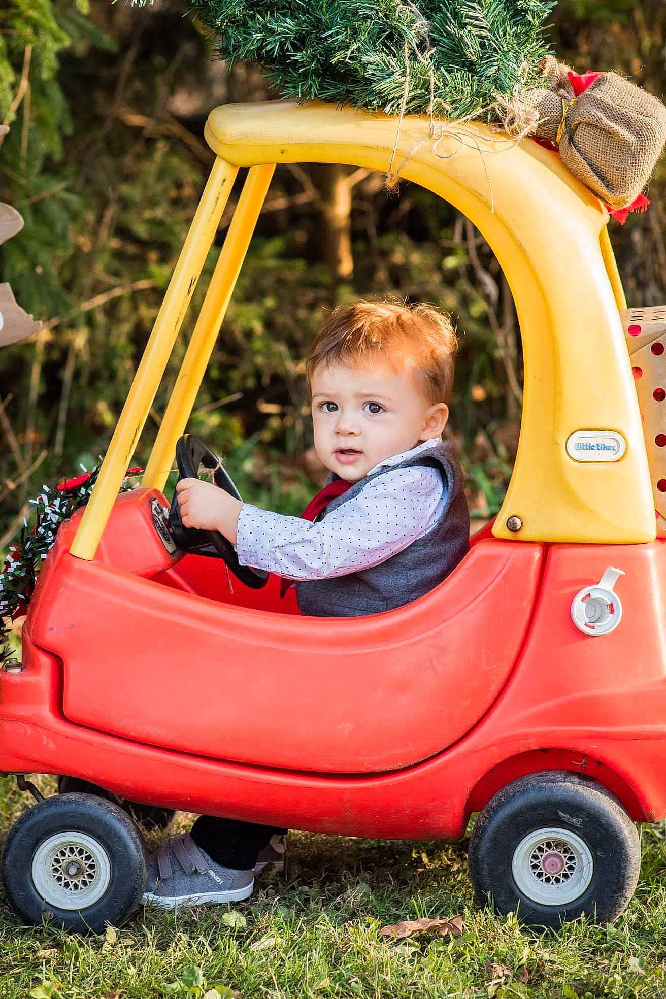 Jeffery joined the competition — help win amazing prizes! baby_products, car, child, city_car, fun, grass, leisure, motor_vehicle, person, photography, pink, plant, play, product, red, riding_toy, summer, toddler, tree, vehicle