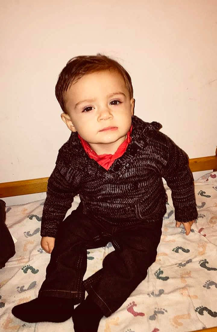 Jeffery joined the competition — help win amazing prizes! baby, cheek, child, face, head, outerwear, person, sitting, skin, sleeve, smile, standing, toddler