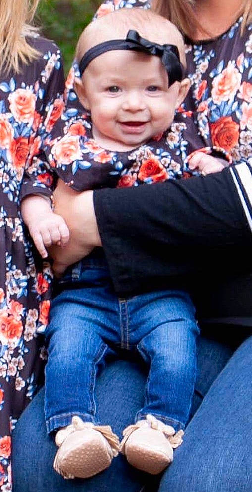 Bristol is registered to the contest to win money with this photo: baby, child, denim, headwear, jeans, joy, people, person, sitting, smile, toddler