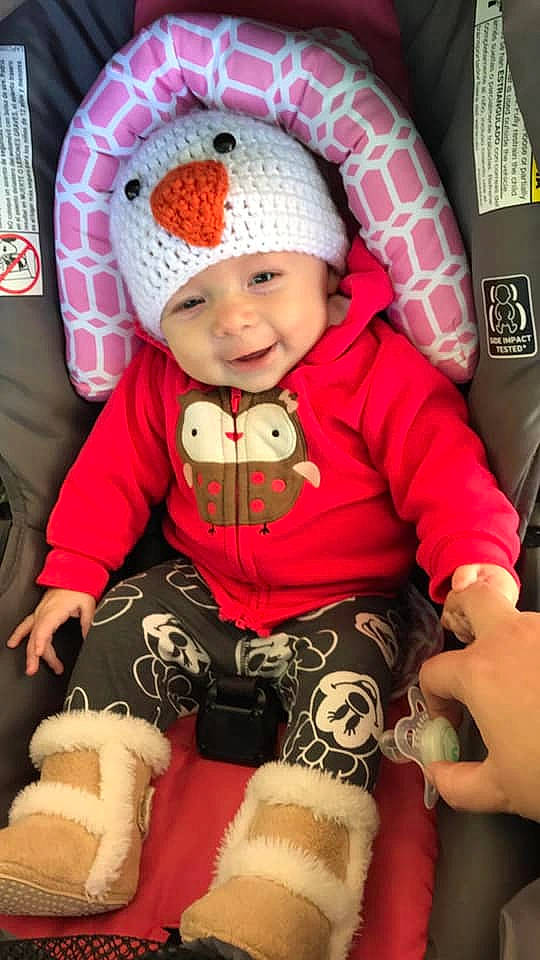 Bristol joined the competition — help win amazing prizes! baby, beanie, cap, child, headgear, knit_cap, person, pink, toddler, toy