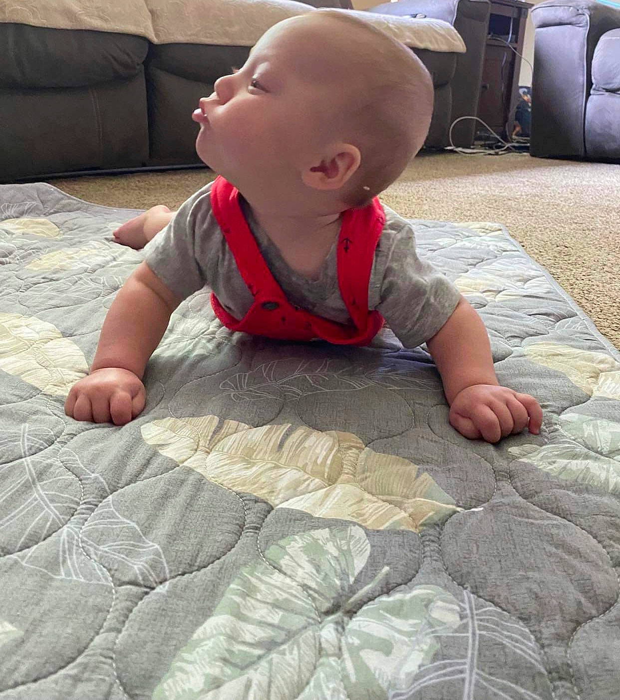 Jude joined the competition — help win amazing prizes! baby, baby_toddler_clothing, carpet, child, comfort, crawling, floor, flooring, fun, grass, hardwood, linens, pattern, person, sitting, skin, smile, snapshot, t_shirt, toddler