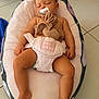Syana participe au concours pour gagner de l'argent avec cette photo : baby, sleeping, pacifier, plush_toy, baby_lounger, diaper, floor, tile, couch, infant, child, relaxing, indoor, comfort, rest, cute, soft_toy, nursery, peaceful, toddler