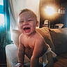 Westley joined the competition — help win amazing prizes! toddler, child, smiling, laughing, indoor, couch, diaper, baby, happy, face, person, furniture, home, curtain, light, window, arm, skin, head, expression