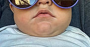 Kaleb joined the competition — help win amazing prizes! baby, child, face, sunglasses, purple_sunglasses, reflection, outdoor, cute, portrait, white_shirt, closeup, person, young_child, head, chin, skin, fashion, accessory, expression, infant