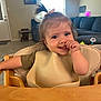Avalynn is registered to the contest to win money with this photo: architecture, baby, blackboard, chair, couch, cutlery, desk, eating, face, food, furniture, head, homedecor, indoors, person, photography, portrait, rug, spoon, table
