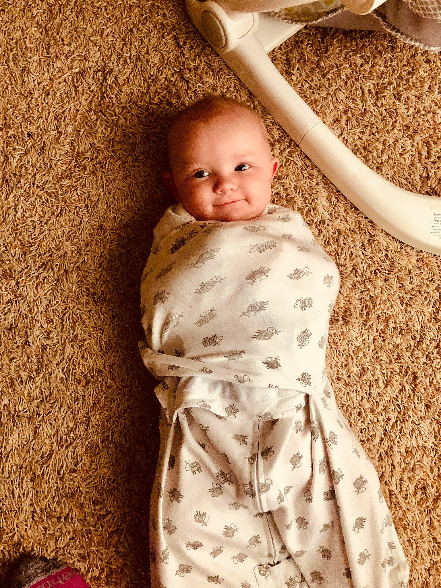 Isabelle joined the competition — help win amazing prizes! baby, baby_toddler_clothing, child, comfort, finger, flooring, fun, happy, human_body, human_leg, joy, linens, mammal, pattern, person, sitting, skin, sleeve, smile, textile