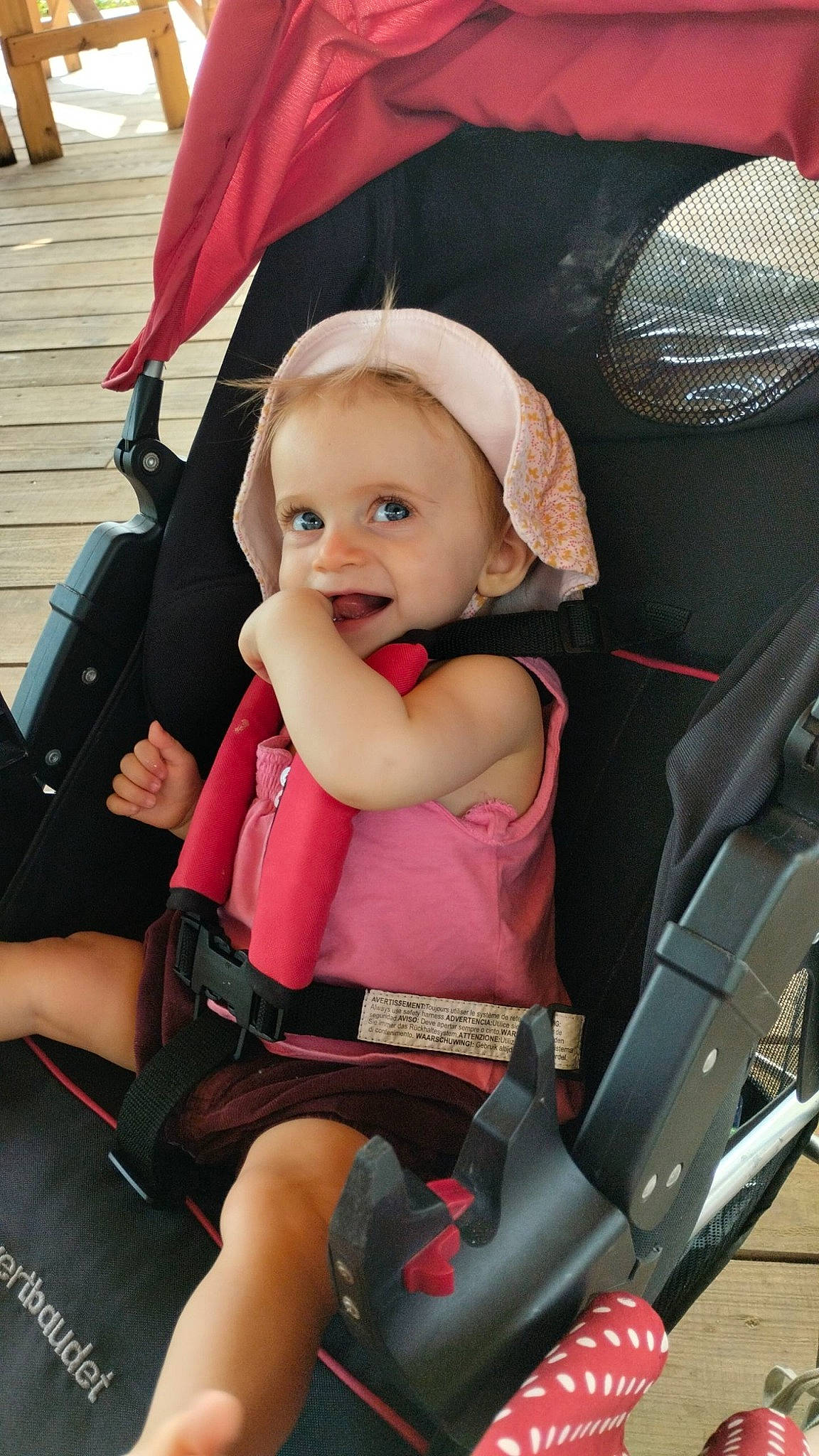 Hanaë participe au concours pour gagner de l'argent avec cette photo : auto_part, baby, baby_carriage, baby_products, beauty, black, car_seat, child, comfort, fun, lap, person, photograph, product, red, smile, snapshot, thigh, tire, toddler