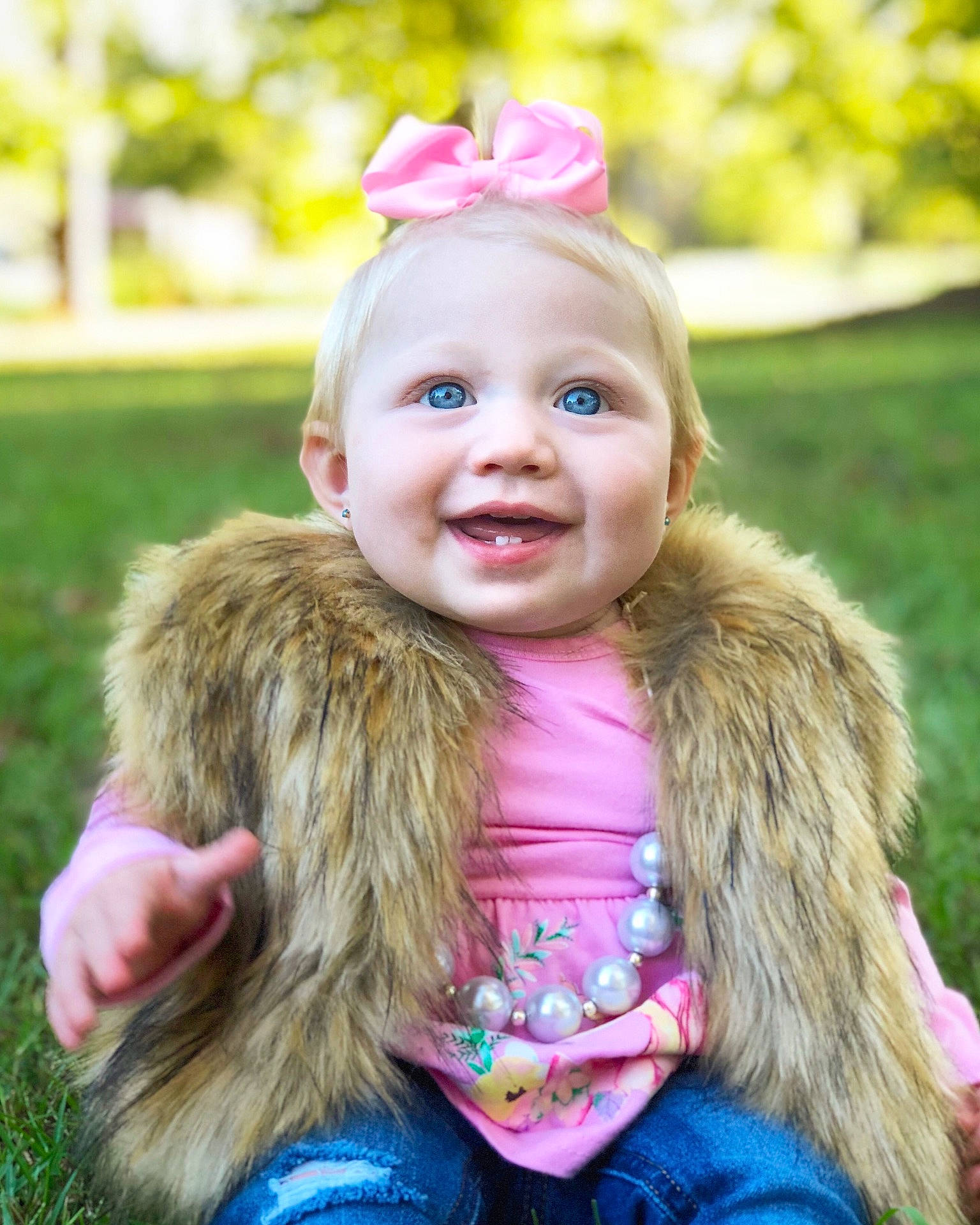 Kaegan is registered to the contest to win money with this photo: cheek, child, child_model, fun, fur, fur_clothing, girl, hair_accessory, happiness, headgear, infant, iris, joy, material, person, pink, skin, smile, textile, toddler