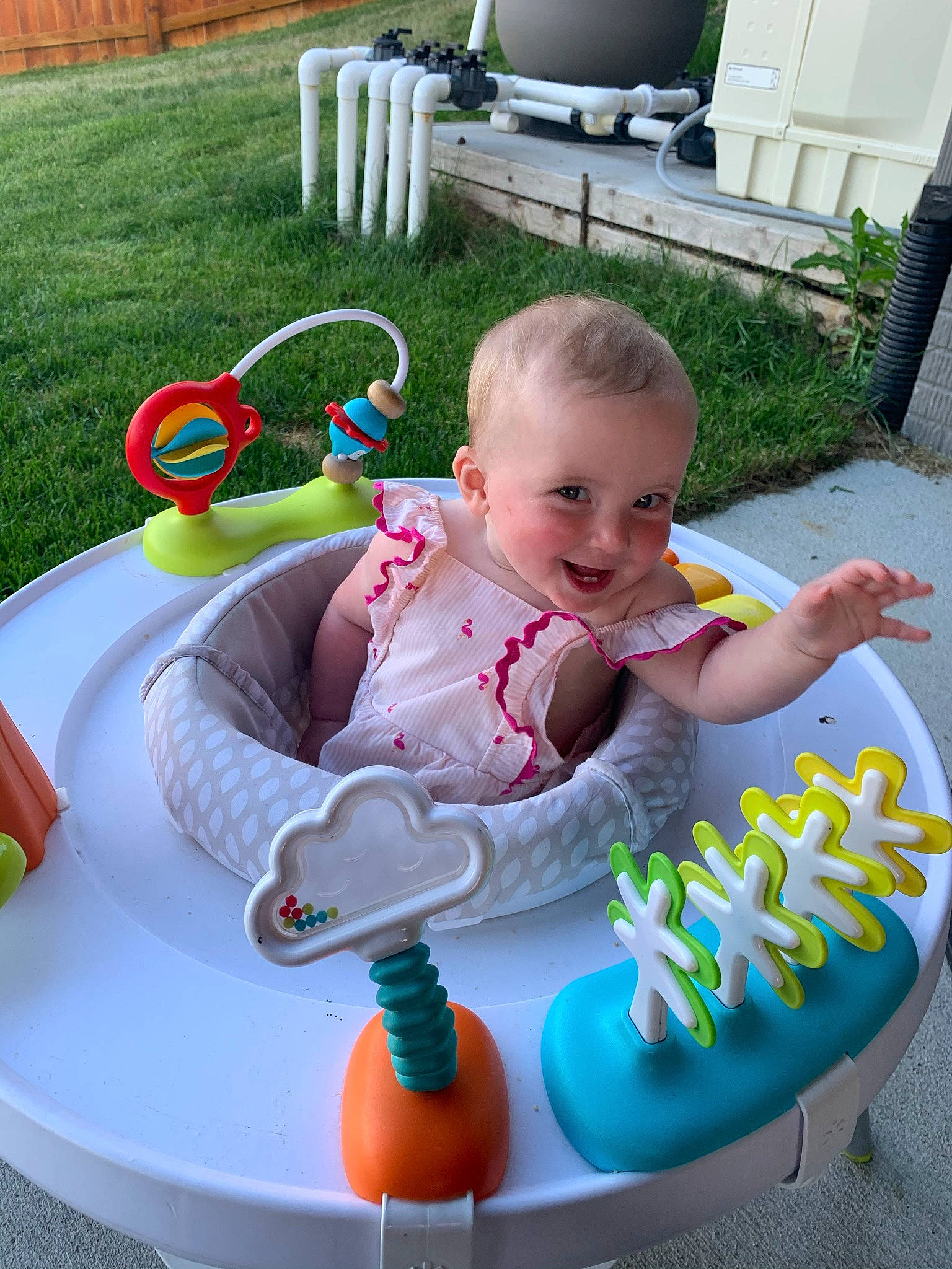 Olivia joined the competition — help win amazing prizes! baby, baby_playing_with_toys, baby_products, baby_toddler_clothing, chair, child, event, face, fun, grass, green, joy, leisure, outdoor_furniture, person, recreation, sharing, sitting, smile, toddler