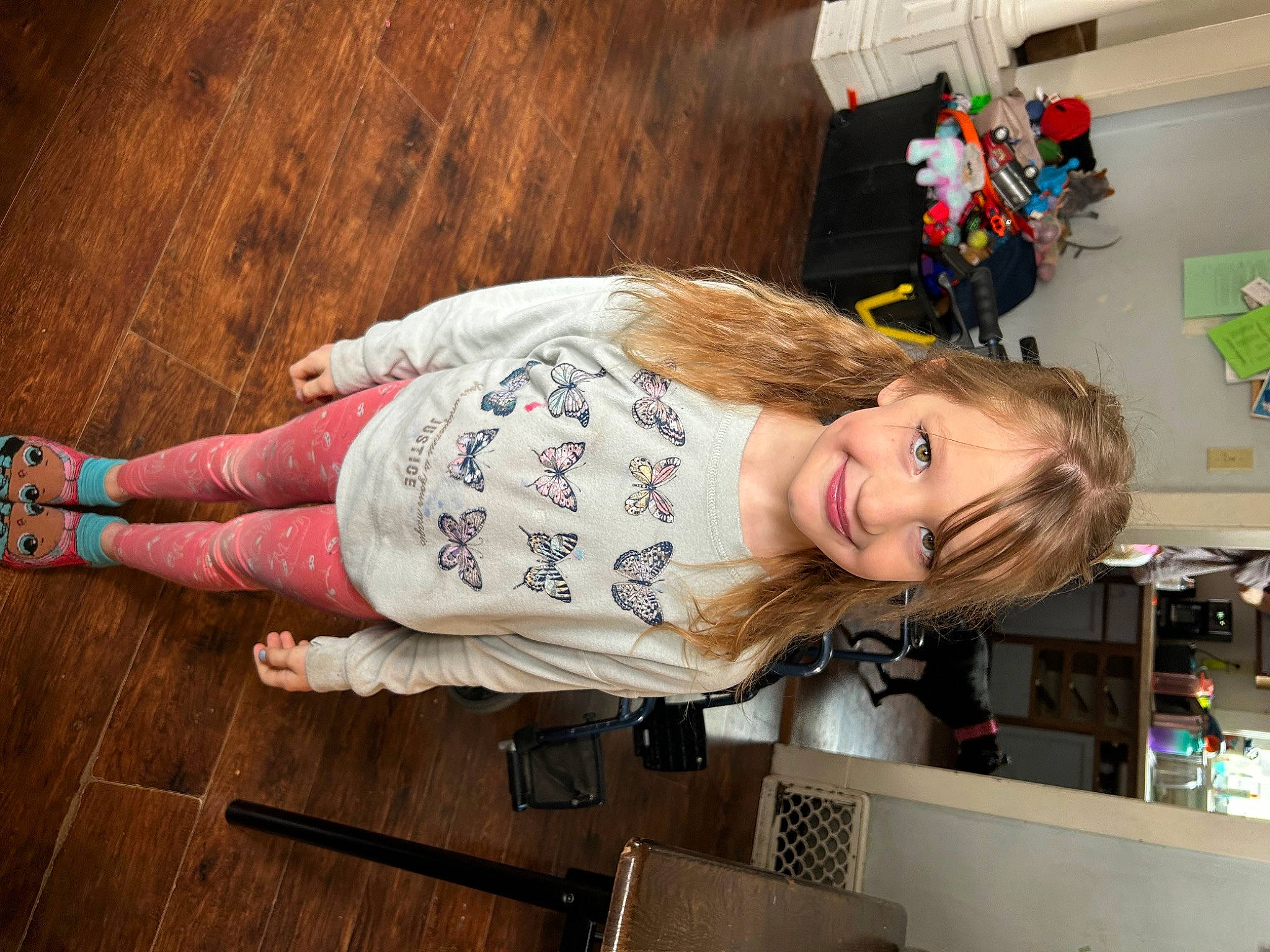 Ambriyah joined the competition — help win amazing prizes! baby_toddler_clothing, child, flooring, foot, fun, hairstyle, happy, hardwood, human_leg, joy, pattern, person, room, sitting, smile, toddler, travel, vacation, wood, wood_flooring