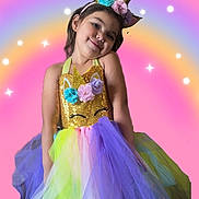 Mia is registered to the contest to win money with this photo: bodypart, clothing, costume, dancing, dress, eveningdress, face, fashion, finger, formalwear, gown, hand, hat, head, leisureactivities, partyhat, person, photography, portrait, purple