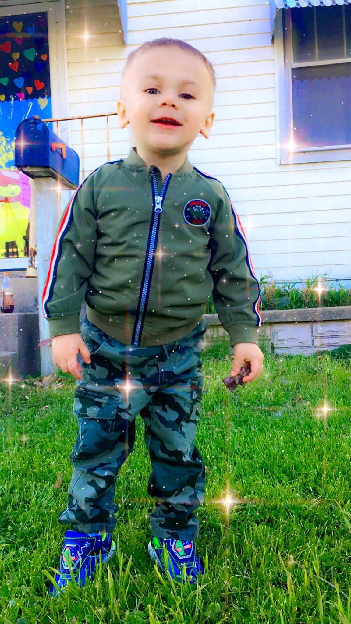 Brice is registered to the contest to win money with this photo: child, jacket, joy, outerwear, person, toddler, uniform