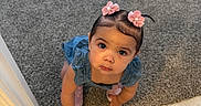 Jazmine is registered to the contest to win money with this photo: toddler, child, girl, hair_clips, pink, blue_dress, crawling, carpet, tile_floor, indoors, curious, looking_up, cute, expression, baby, person, small, floor, hand, footwear