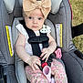 Zayley joined the competition — help win amazing prizes! baby, infant, car_seat, headband, bow, pacifier, clothing, straps, pink_socks, floral_pants, outdoor, grass, child, person, cute, portrait, seatbelt, safety, young, hands