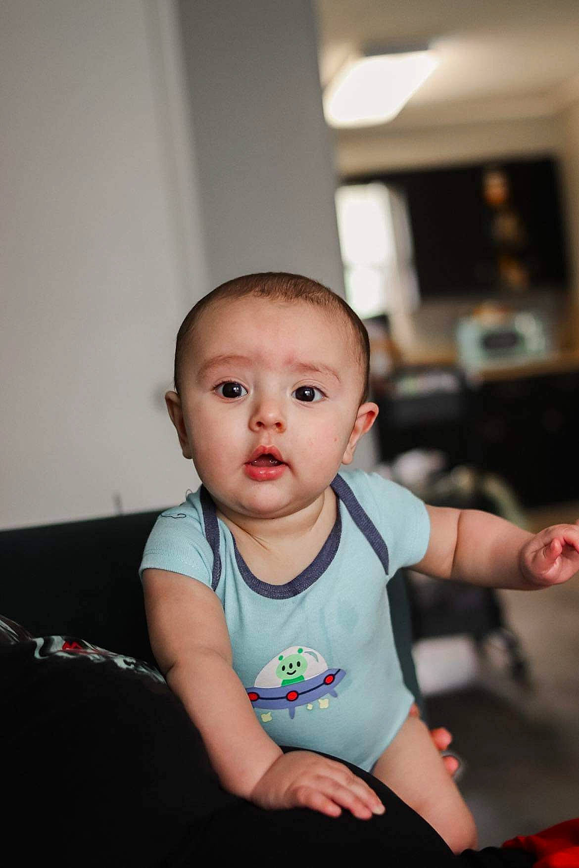 Javion joined the competition — help win amazing prizes! baby, baby_toddler_clothing, cheek, child, elbow, event, finger, flash_photography, flooring, fun, hand, happy, human_leg, person, portrait_photography, room, sitting, skin, sleeve, t_shirt