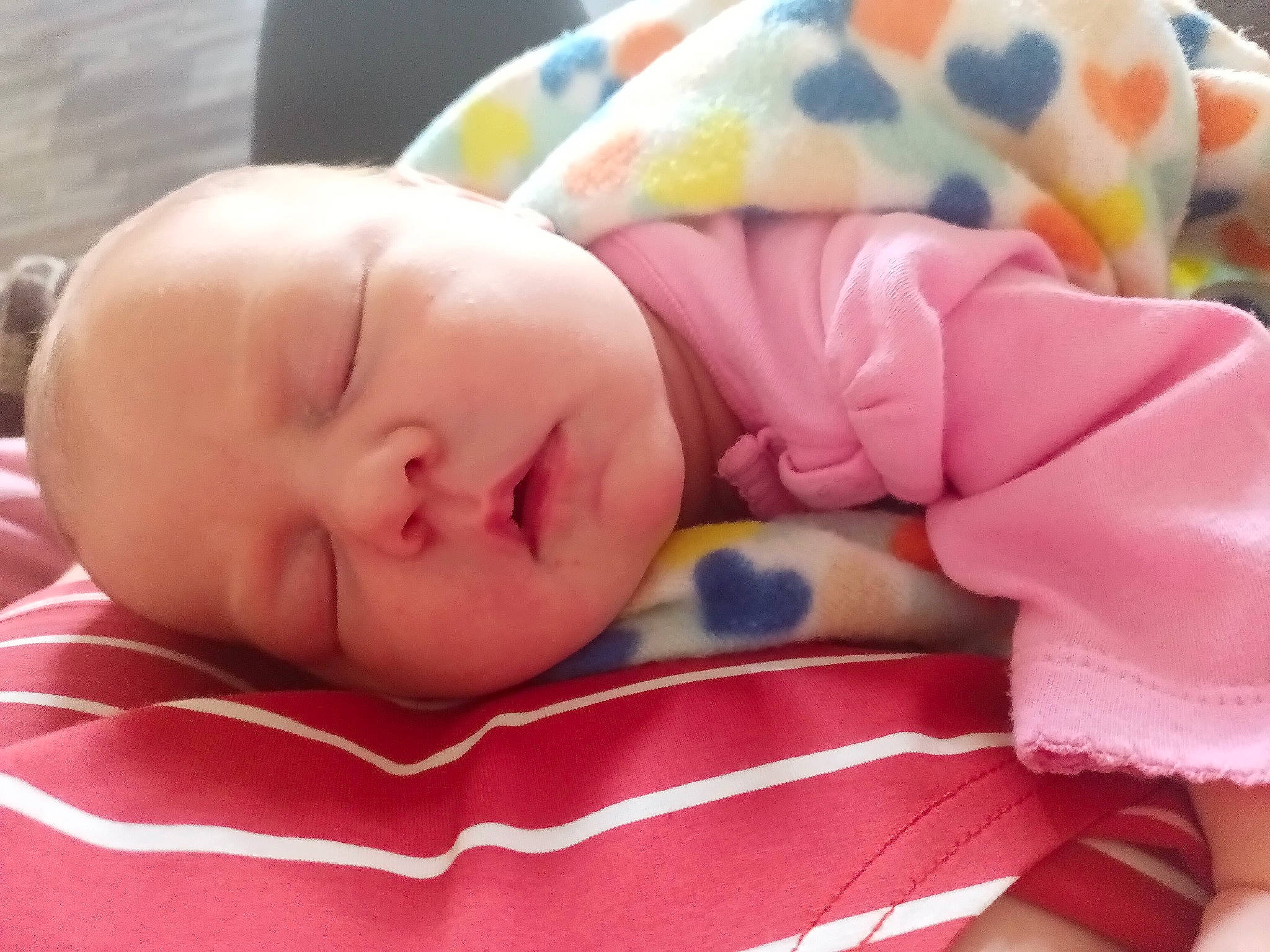 Penelope is registered to the contest to win money with this photo: baby, baby_products, baby_sleeping, baby_toddler_clothing, bedtime, cheek, child, comfort, ear, face, happy, head, linens, magenta, nap, nose, person, pink, skin, textile