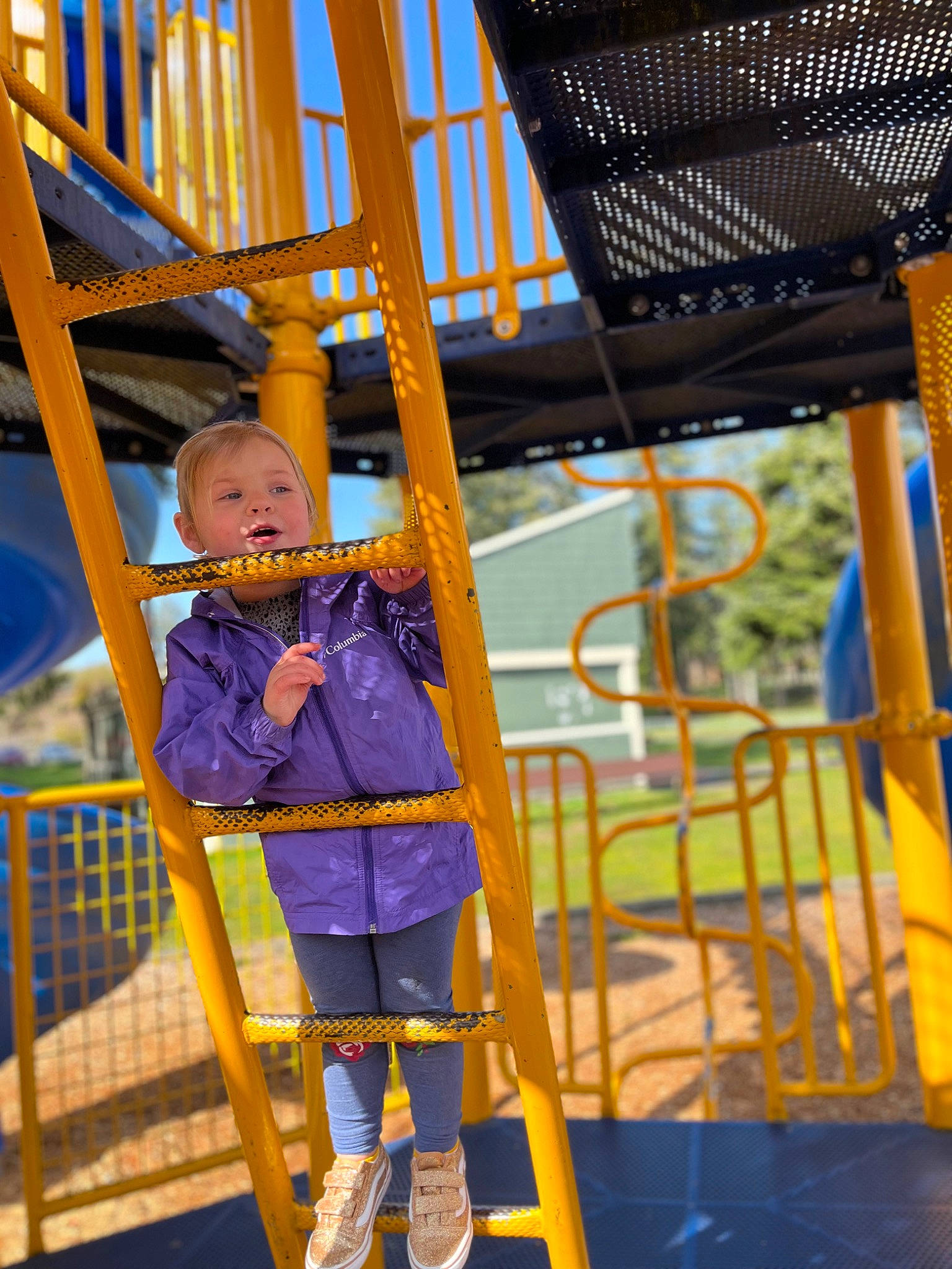 Nereida is registered to the contest to win money with this photo: amusement_park, amusement_ride, baby, baby_toddler_clothing, child, city, electric_blue, fun, leisure, outdoor_play_equipment, person, play, playground, playground_slide, recreation, swing, symmetry, toddler, tree, vacation